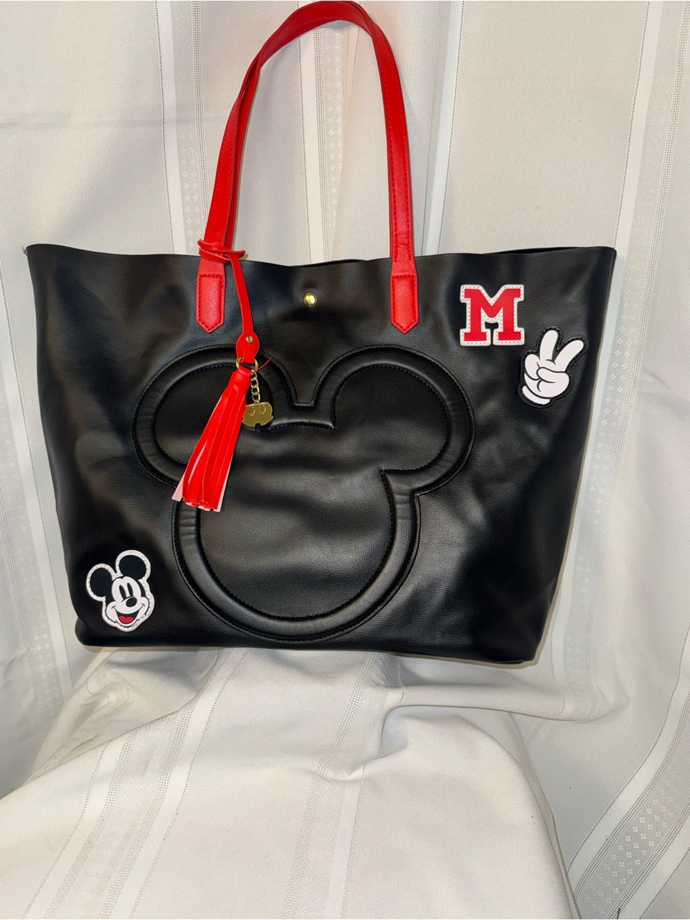 Black Tote with Red Handles and Playful Mickey Accents